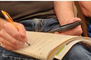 taking a lot of notes at a MAREI real estate investor meeting