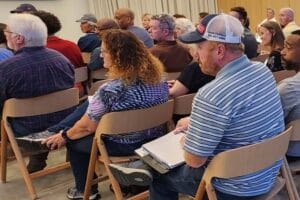 The speakers are full of valuable information at a MAREI real estate investor meeting.